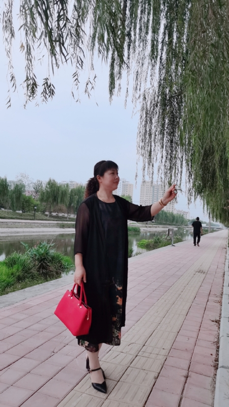 周本玲的第一张照片--沈阳相亲服务中心